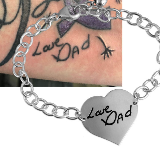Silver bracelet with handwriting on it, with the tattoo that has the original writing