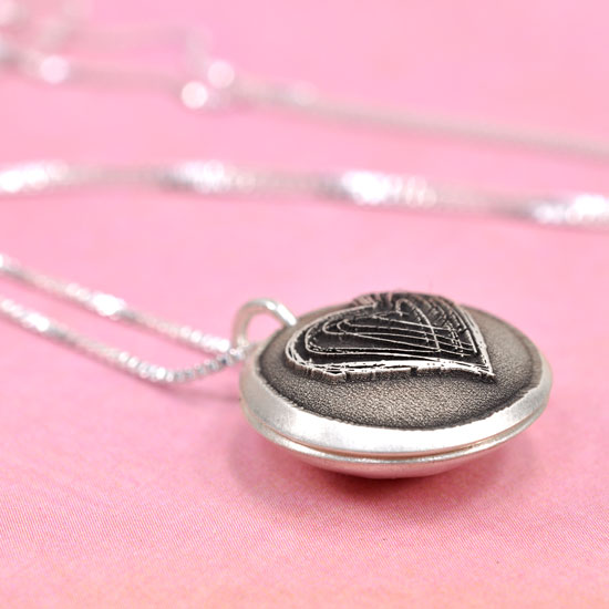 Mother's Hug Locket, shown from the side
