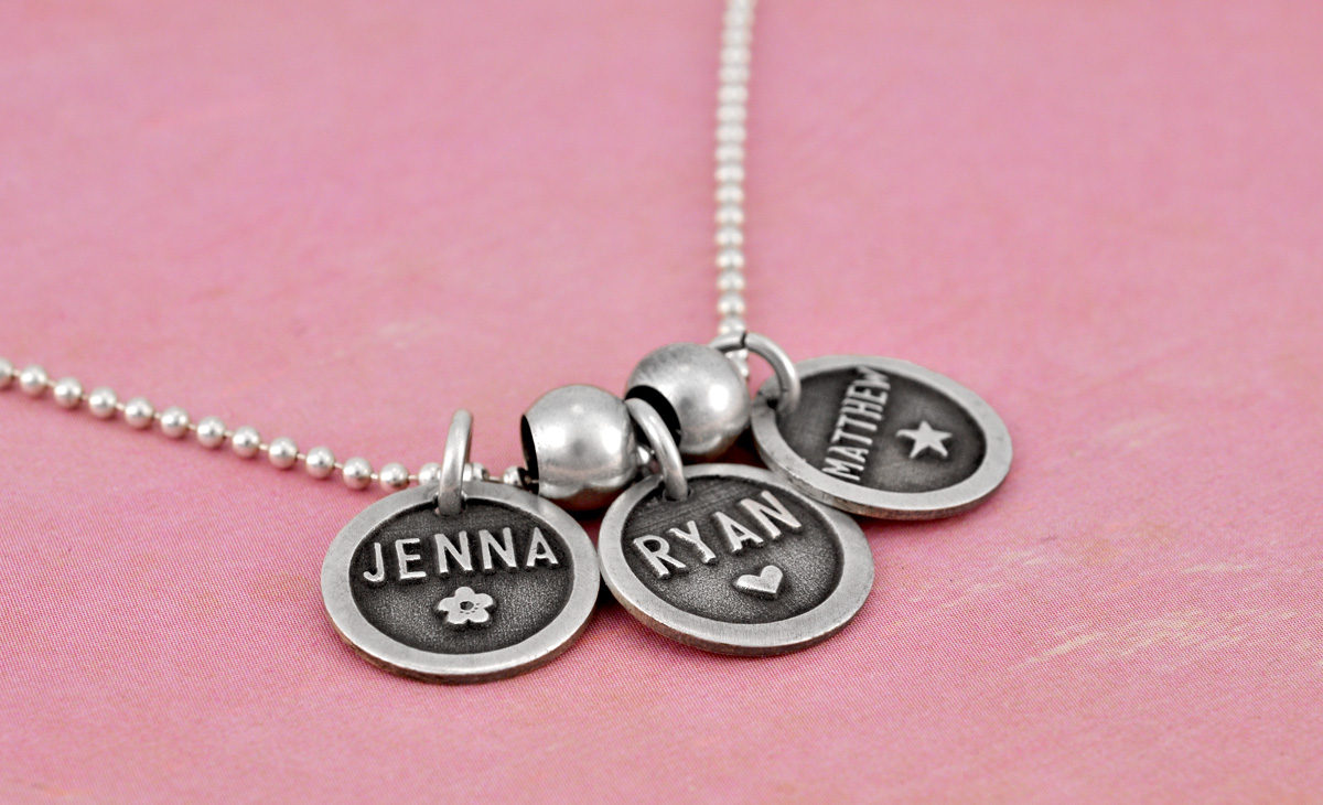 Etched Name Discs in sterling silver with kids' names