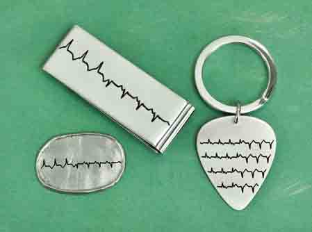 Personalized jewelry etched with a baby's heartbeat