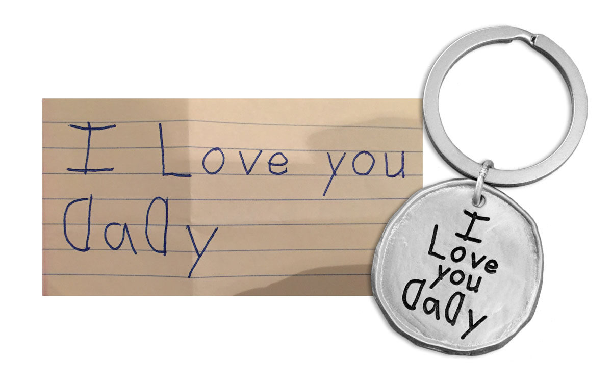 Handwriting Round Tag Key Chain Pewter, shown with original handwriting used to create the product