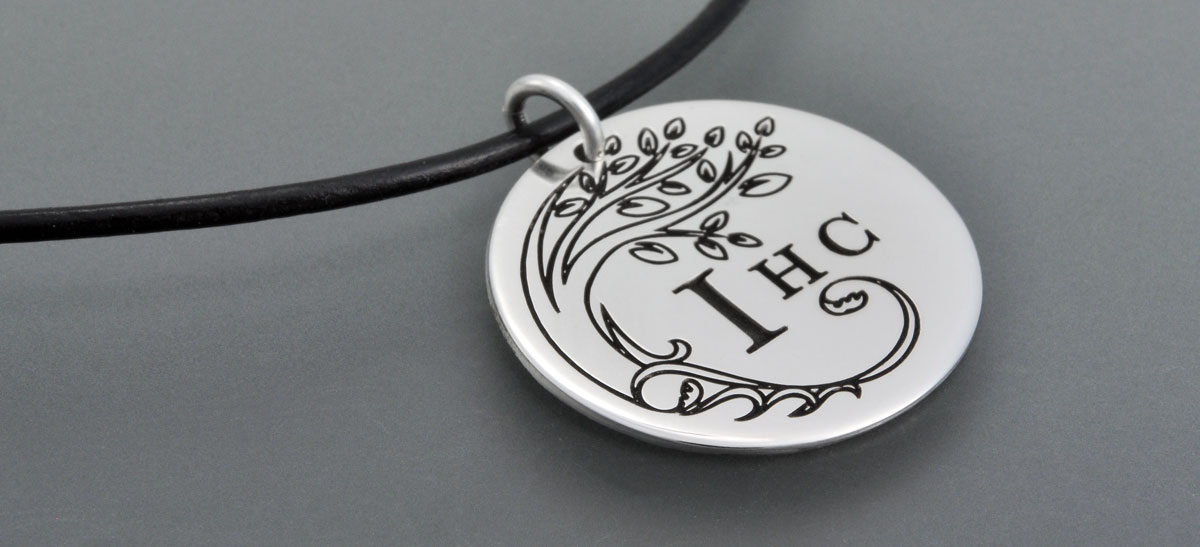 Silver Disc Handwriting Necklace, shown with a logo