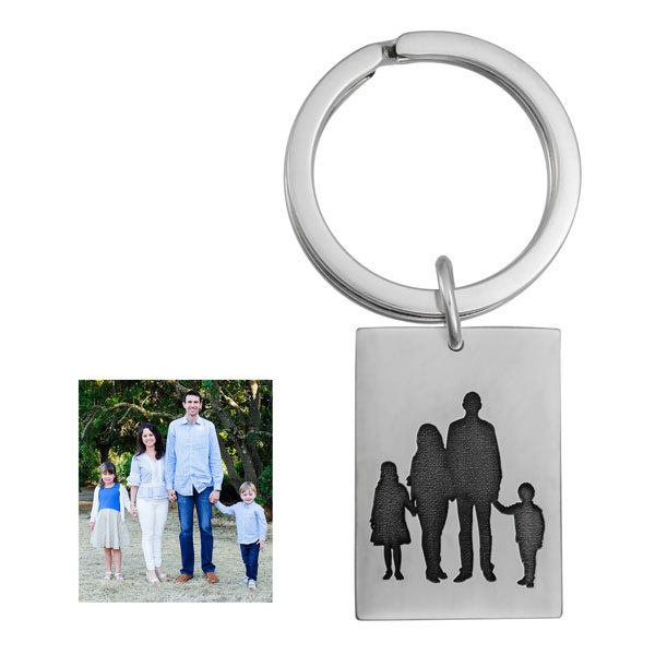 photo of a family, and a silhouette of the photo on a sterling silver key chain